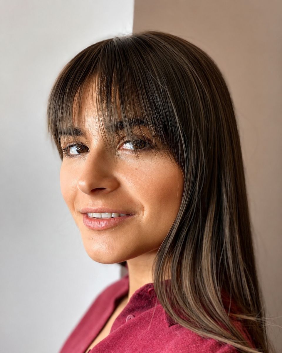 Long layered cut with a full fringe